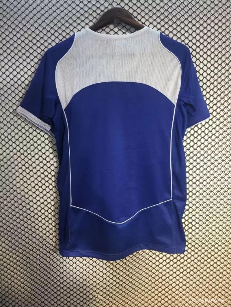 قميص أزرق عتيق من البرازيل 2004 ذهاباً وإياباً
