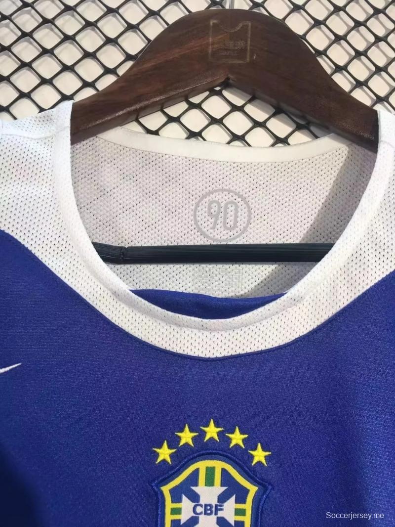 قميص أزرق عتيق من البرازيل 2004 ذهاباً وإياباً
