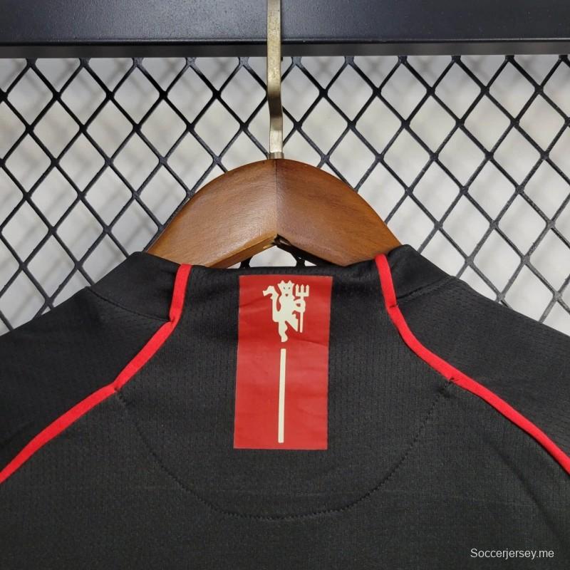 قميص ريترو كيدز 07/08 مانشستر يونايتد ذهاباً وإياباً 16-28
