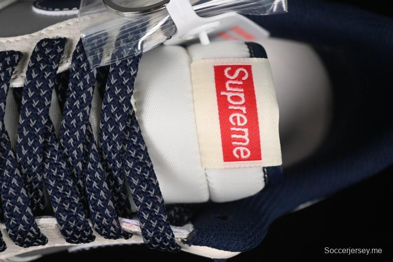 حذاء نايك اير فورس 1 '07 منخفض سوبريم سوبريم بالتعاون مع نايك باللون الرمادي والأزرق الكاجوال - HH7518-054