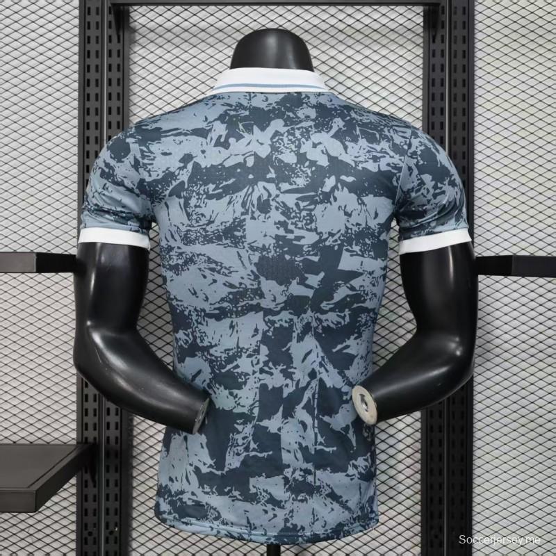 إصدار اللاعب 25/26 قميص الأهلي الرمادي بنقشة التمويه 25/26