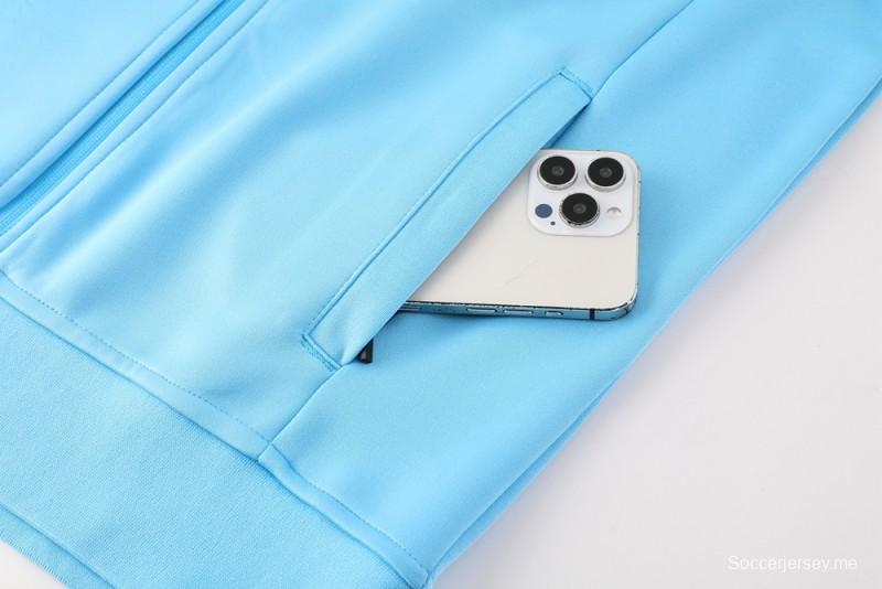 طقم بدلة رياضية نايك إير 2025 - أزرق فاتح مع لمسات كحلية اللون أزرق فاتح مع جاكيت بسحاب كامل + بنطال طويل