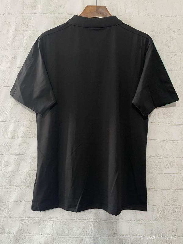 قميص بولو فريق مرسيدس-AMG بتروناس للفورمولا وان 2025 F1 أسود مع ثلاثة خطوط تركوازية