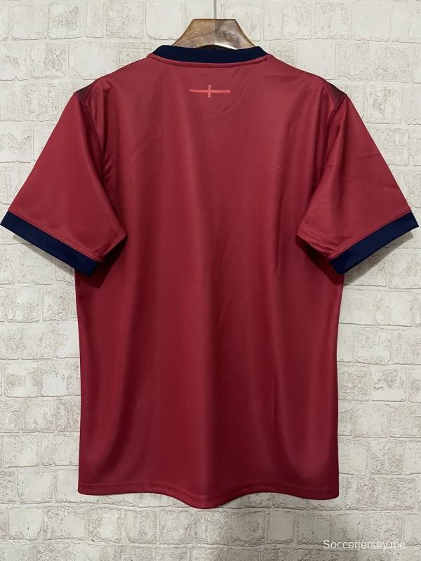 2026 قميص إنجلترا 2026 باللون العنابي بنقوش هندسية ورسومات تراثية