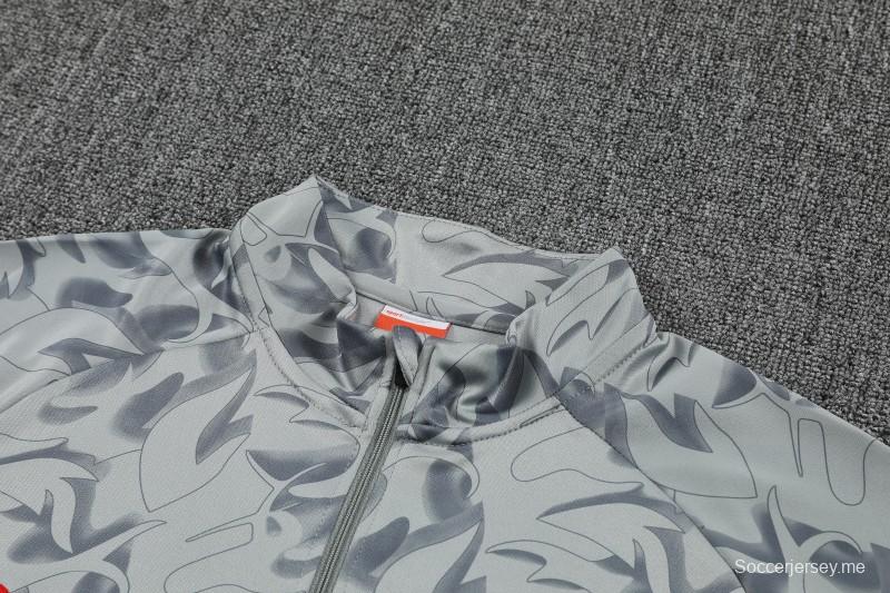 إصدار اللاعب 25/26 ميلان ميلان رمادي بنقشة مموهة بنصف سحاب سترة رياضية + بنطال طويل