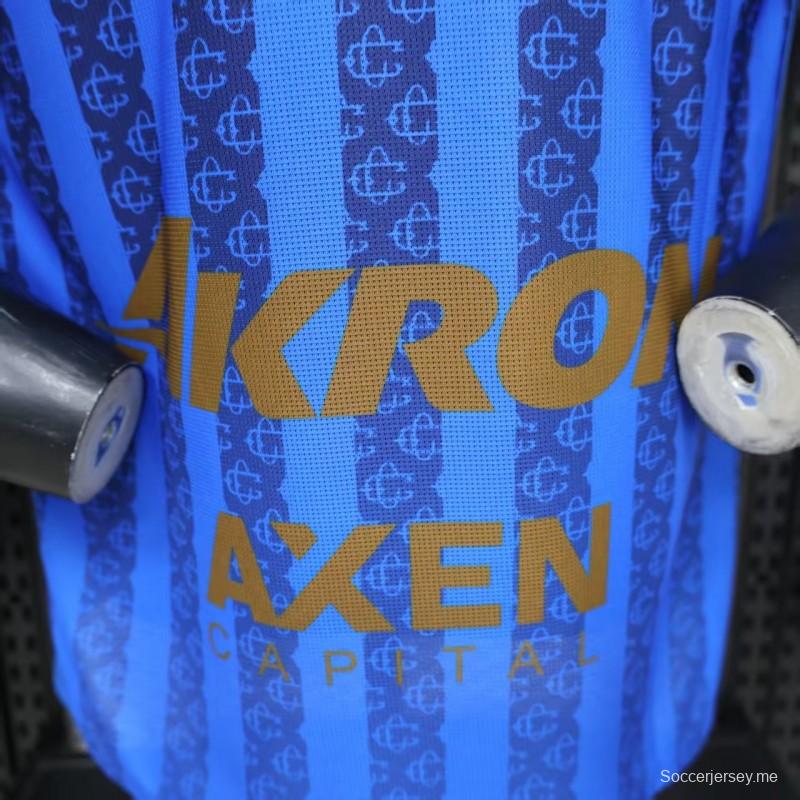 قميص اللاعب رقم 26/27 لفريق تشيفاس غوادالاخارا (قميص خارجي أزرق بنمط خطوط داكنة)