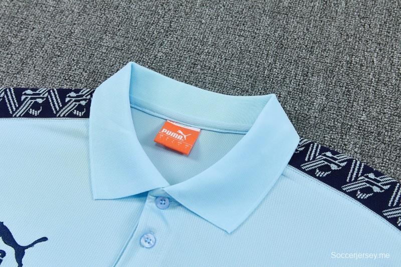 26/27 طقم رياضي من مانشستر سيتي يتألف من قميص بولو أزرق فاتح + بنطال طويل