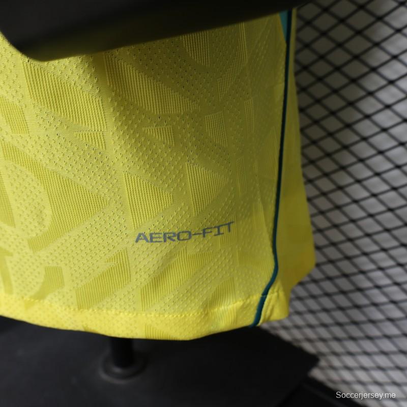 قميص اللاعب رقم 2026 باللون الأصفر البرازيلي بنمط هندسي - قميص المباريات على أرض الفريق