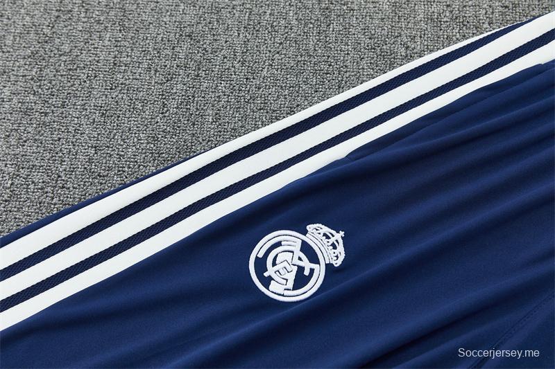 26/27 ريال مدريد - بدلة رياضية باللون الأزرق الداكن بسحاب نصف طول + بنطال طويل