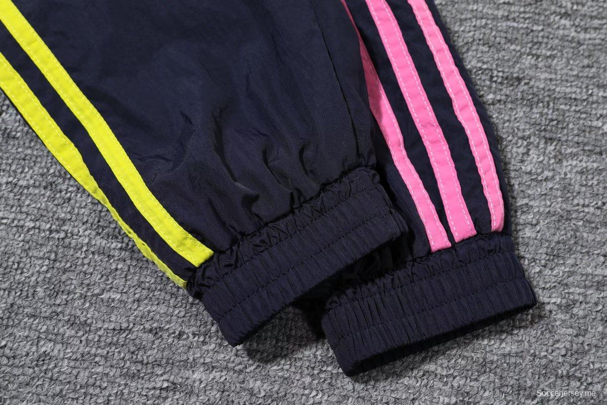 24/25 يوفنتوس سترة واقية من الريح باللون الكحلي + بنطال طويل + بنطلون طويل