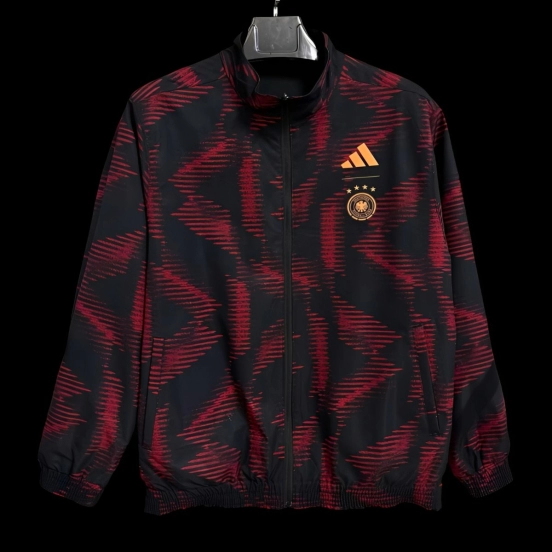 2025 ألمانيا سترة واقية من الرياح سوداء مع نمط هندسي أحمر وسحاب كامل