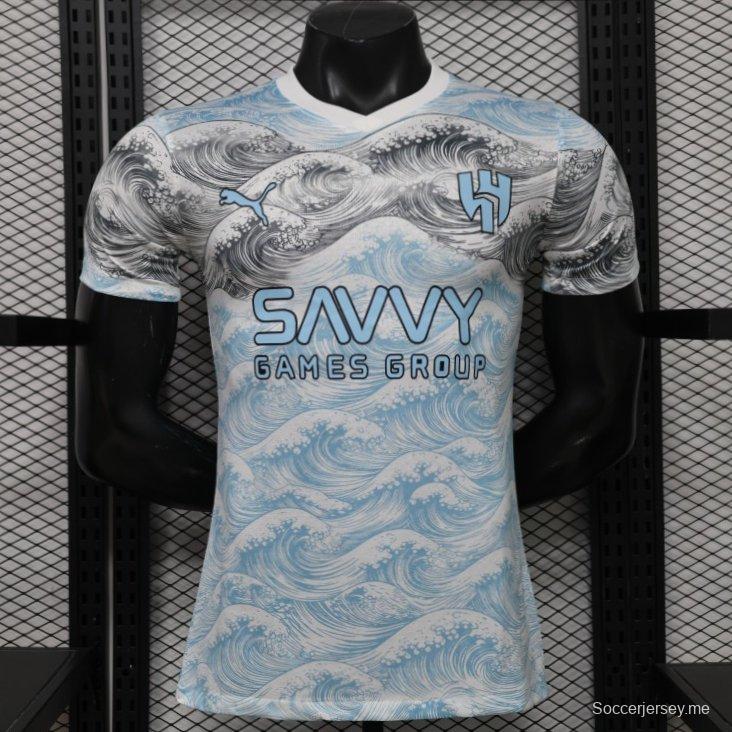 قميص الهلال لكرة القدم، إصدار اللاعبين 26/27، أبيض وأزرق، بنقشة موجة هوكوساي، إصدار خاص للملابس الخارجية